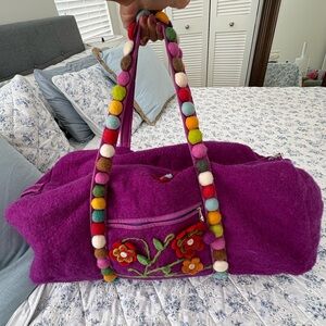 Handmade in Nepal purple felted wool bag with pom poms